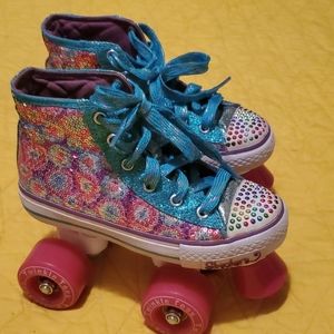 Twikle toe sketcher skates